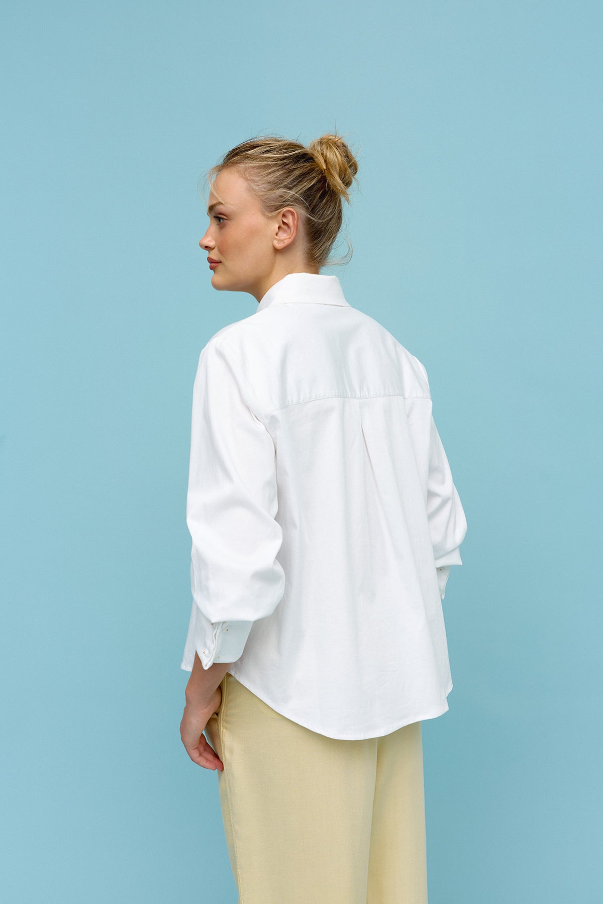 PLEATS. Top.